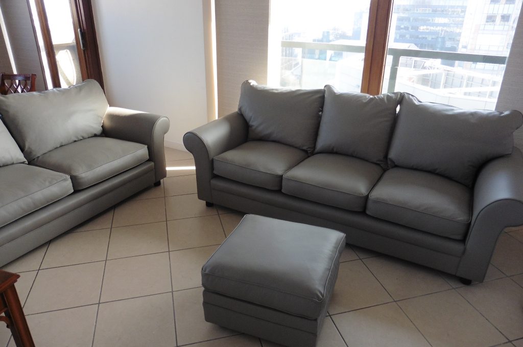 recover leather sofa cost