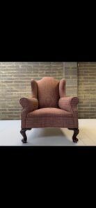 reasons to reupholster Edwardian wing chair and bespoke pouffe Essex